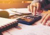 9 Practical Budgeting Tips to Implement Right Away A close up of a keyboard Description automatically generated