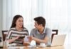 Loan or Line of Credit: What’s the Difference? Young couple managing family budget at home Free Photo