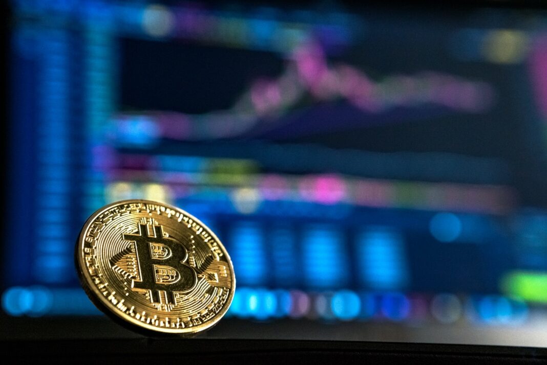 Photo by André François McKenzie gold-colored Bitcoin