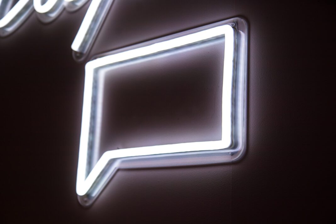 Photo by Jason Leung white neon light signage on wall