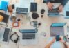 How does Technology Enhance Creativity at the Workplace? people sitting down near table with assorted laptop computers