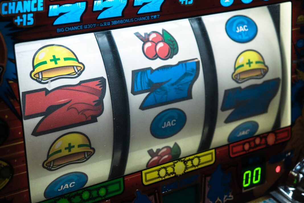Photo by DEAR slot machine displaying three seven