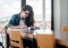Helpful Tips for Effective Studying as an ESL Student woman writing on book