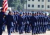 5 Qualities Of A Good Candidate parade of troop in blue formal attire
