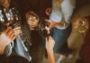 5 Casual Outfits to Slay in a Party group of people tossing wine glass