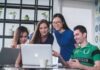 How to Use Online Learning Software Effectively four people watching on white MacBook on top of glass-top table