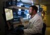 5 reasons to hire an expert to write my lab report man in white dress shirt sitting on black office rolling chair