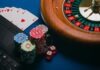 Beginner Tips for Online Gambling playing cards on brown wooden table