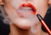 Switching to an E-cigarette? woman with red lipstick and red lipstick