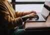 The Importance of eCogra and Egap in the iGambling Industry person sitting front of laptop