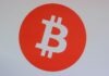 Bitcoin Trading Robot and their advantages red and white cross logo