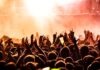 How to Prepare for a Music Festival?  people raising their hands on concert