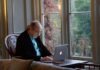 Why Online Casinos Appeal to Seniors? man in black suit jacket using macbook