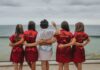 Checklist Guide for Maid of Honor Duties brides and bridesmaid looking at the back