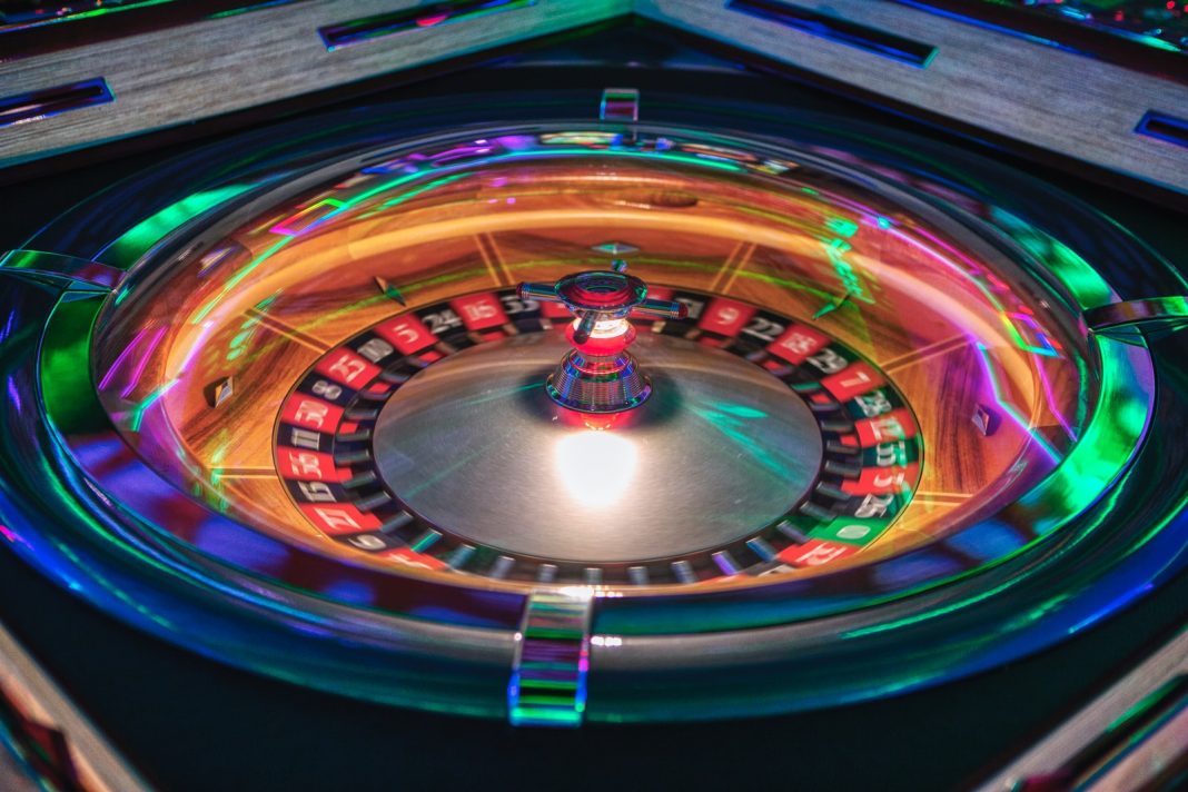 Photo by Adi Coco blue red and green round light