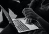 The Best Ways to Play Poker Games Online grayscale photo of person using MacBook