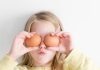 10 Breakfast Ideas for School: Healthy Lunchbox Ideas With Albertsons Market girl holding two eggs while putting it on her eyes