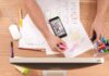 Organizing Content Auditing: Key Factors to Organizational Productivity person writing on white paper