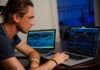 The paradigm shift moves traders back to the forex platforms man sitting in front of the MacBook Pro
