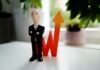 What You Need to Know Before Becoming a Financial Planner man in black suit jacket and black pants figurine