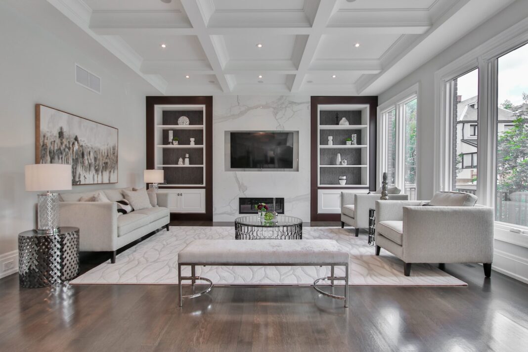 Photo by Sidekix Media white wooden coffee table near white sofa