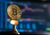 How will Web 3.0 and blockchain disrupt the entire internet? selective focus photo of Bitcoin near monitor