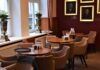 5 Ways Restaurant Furniture Can Upgrade Your Eatery brown wooden table with chairs