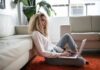 Why You Should VPNs, Quality Proxies, and Anti-detect Browsers Together woman sitting on floor and leaning on couch using laptop