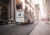 Supply Chain Relationships in Fintech Are Embraced by Blockchain white van parked beside brown concrete building during daytime