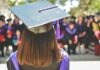 woman wearing academic cap and dress selective focus photography