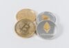 Which Cryptocurrency, Bitcoin or Ethereum, Is Superior? four round silver-colored and gold-colored Bitcoins
