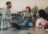 The Project Management Process: A Step-by-Step Guide for Startup Teams a group of people sitting around a table