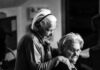 When is The Right Time for Someone Who Has Dementia to Move Into Care Homes greyscale photo of woman standing behind woman sitting on chair