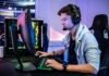 Cybersports (News, Events) a man wearing a headset sitting in front of a computer