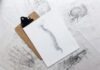The Importance of Local SEO for Chiropractors: Tips and Tricks brown and black clipboard with white spinal cord print manual