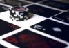 Popular Online Casino Games poker chip on white surface