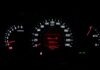 Common Reasons Why a Brake Light on the Dashboard Is On closeup photo of black car instrument cluster panel