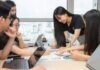 5 Advantages of Flexible Learning Management Systems for Organizations women using laptops