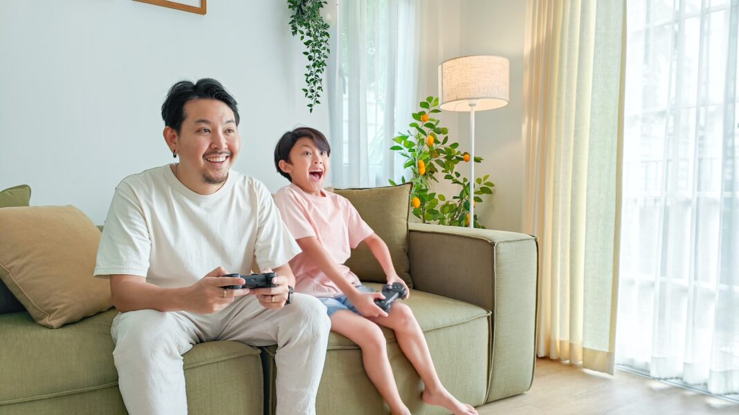 Photo by OPPO Find X5 Pro a person and a child sitting on a couch