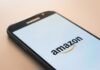 How To Find And Identify Trending Products On Amazon 2023? black Samsung Galaxy smartphone displaying Amazon logo