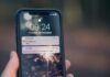 How to integrate a push notification service into an existing app or website person holding phone