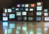 The Future of TV Advertising: Trends to Watch Out For black plastic frame on brown wooden floor