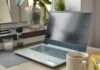 How Do I Search for Affiliate Programs: A Comprehensive Guide a laptop computer sitting on top of a wooden desk
