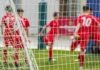 Tips For Sports Betting In the UK: Maximise Your Winnings soccer players in red jersey shirt playing soccer during daytime