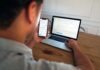 Investing in Winchester’s Buy-to-Let Market: A Guide for Landlords man in gray hoodie holding black smartphone