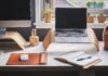 Protecting Yourself From Home Office Warranty Frauds black and silver laptop on brown wooden rack