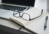 The Top 5 Best Engaging Websites for Free: Explore the Online World of Entertainment and Learning black framed eyeglasses and black pen