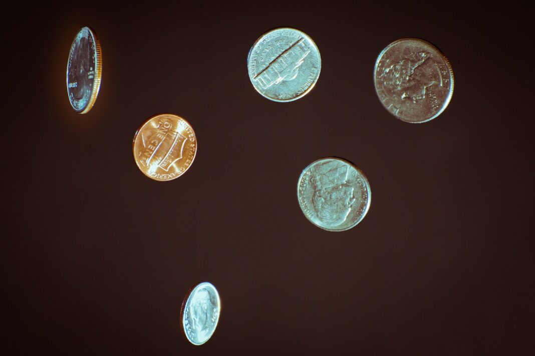 Photo by Chris Briggs silver round coins on white surface