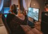 Easy Ways to Improve Online Gameplay A person sitting at a desk playing a video game Description automatically generated