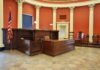 What Is the Meaning of Mistrial? a room with a desk and chairs in it